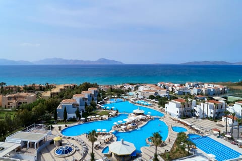 Indoor pool, seasonal outdoor pool, pool umbrellas, sun loungers