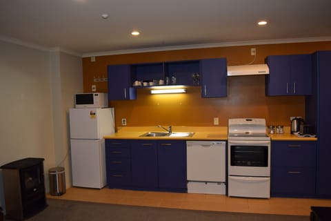 Three Bedroom Apartment | Private kitchen | Fridge, microwave, coffee/tea maker, electric kettle