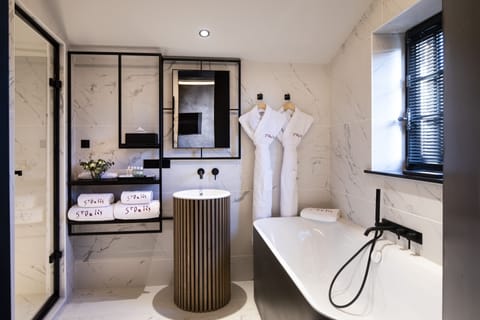 Junior Suite, Jetted Tub | Bathroom | Designer toiletries, hair dryer, bathrobes, slippers