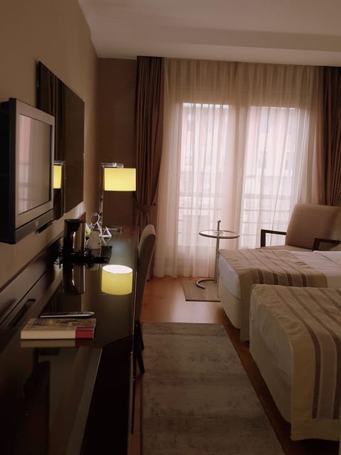 Double or Twin Room | Living area | LCD TV