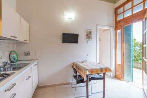 Family Apartment, 1 Bedroom, Lakeside (Casetta al Lago) | Living room | Flat-screen TV, DVD player