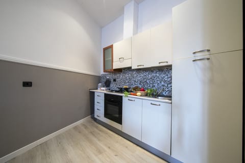 Family Apartment, 2 Bedrooms, 2 Bathrooms, Lakeside (Menaggio Tosca 1) | Private kitchen | Full-size fridge, microwave, oven, stovetop