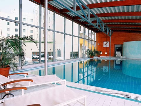 Indoor pool, open 6:00 AM to 10:00 PM, sun loungers