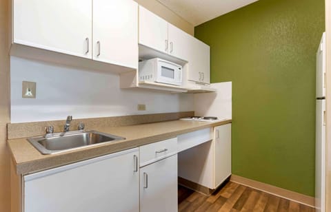 Studio, 1 King Bed, Non Smoking | Private kitchen | Fridge, microwave, stovetop