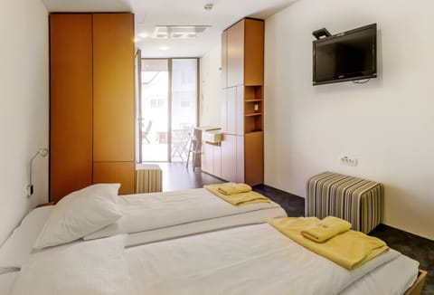 Standard Double or Twin Room | In-room safe, individually furnished, desk, soundproofing