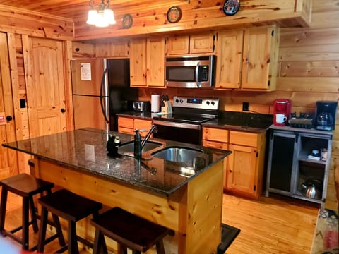 Kitchen with island and coffee bar