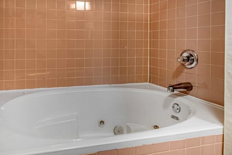 Room, 2 Queen Beds, Non Smoking, Jetted Tub | Bathroom | Free toiletries, hair dryer, towels, soap