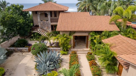 Front of the house with landscaping view.