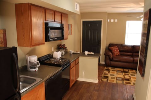 Suite, 1 Queen Bed, Accessible, Kitchen | 1 bedroom, desk, blackout drapes, iron/ironing board