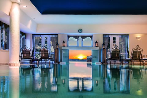 Indoor pool, outdoor pool, pool umbrellas, sun loungers