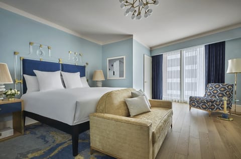 Premium bedding, down comforters, pillowtop beds, minibar