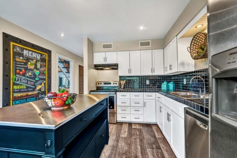 Fully stocked kitchen with pots/pans, bakeware, mixer, blender and more!