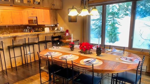 First Floor - Dining Table - Kitchen in Background with Hightop Dining.
