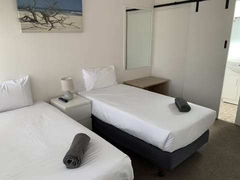 Two Room Family Suite | Blackout drapes, iron/ironing board, free WiFi, bed sheets