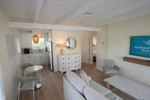 Suite, 1 Bedroom, Pool View | Living area | Flat-screen TV