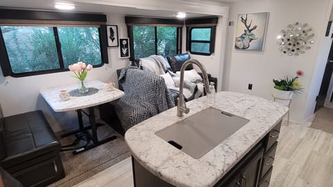 Looking into the living room- table folds into bed