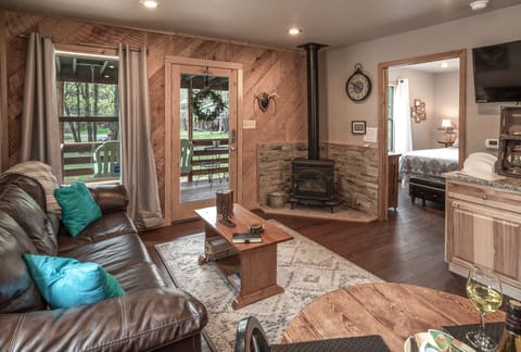 Cabin, 1 Bedroom | Living area | TV, fireplace