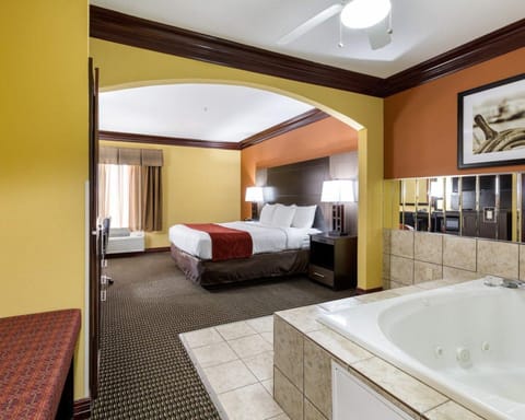 Suite, 1 King Bed, Non Smoking | In-room safe, desk, laptop workspace, iron/ironing board