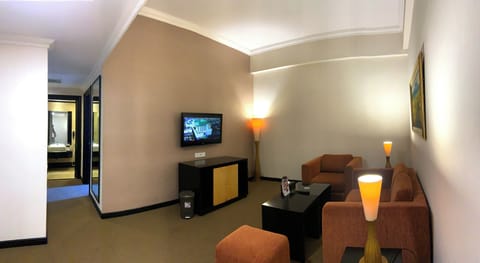 Junior Suite | Living area | 32-inch LCD TV with satellite channels, TV