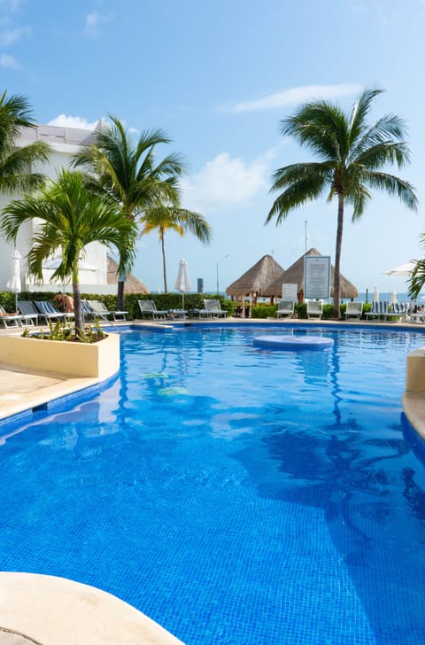 2 outdoor pools, open 8:00 AM to 8:00 PM, pool umbrellas, sun loungers