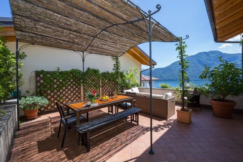 Family Apartment, 3 Bedrooms, 2 Bathrooms, Mountainside (Bellavista Mezzegra) | Outdoor dining