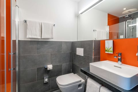 Shower, eco-friendly toiletries, hair dryer, towels