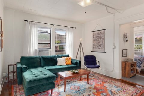 The Wildflower is colorfully decorated with a blend of new furnishings and vintage finds! With lots of windows that overlook downtown, this is the perfect place to experience the heart of Fayetteville.