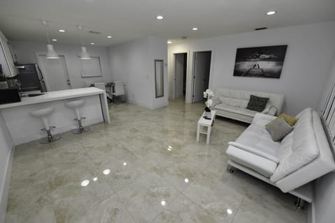 Come enjoy a modern style home and newly renovated 2 BR duplex apartment.