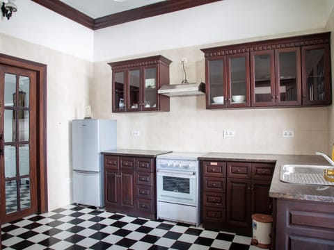 Suite, 2 Bedrooms | Private kitchen | Fridge, stovetop, electric kettle, toaster