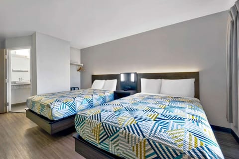 Deluxe Room, 2 Double Beds, Non Smoking, Refrigerator & Microwave | Desk, free WiFi, bed sheets