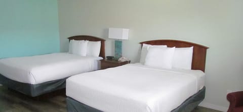 Deluxe Room, 2 Queen Beds | Desk, blackout drapes, iron/ironing board, free cribs/infant beds