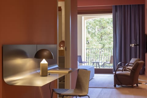 Junior Suite, Terrace | Premium bedding, minibar, in-room safe, individually decorated