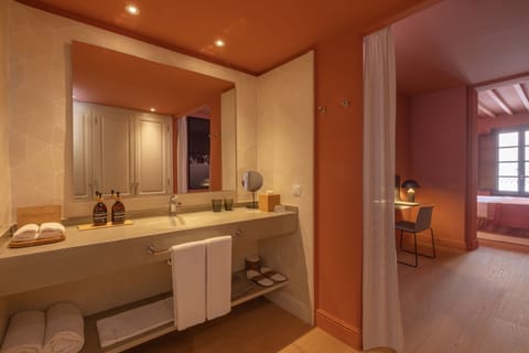 Deluxe Double Room | Bathroom | Rainfall showerhead, designer toiletries, hair dryer, bathrobes