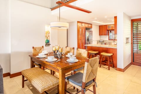 Gather around the indoor dining table for six—perfect for family meals or game nights after beach days.