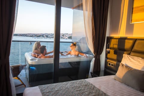 Presidential Suite, Hot Tub, Sea View | Memory foam beds, minibar, in-room safe, individually furnished