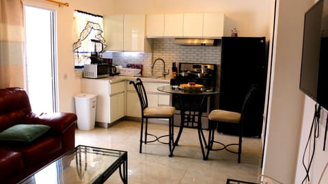 Basic Apartment, 2 Bedrooms | Private kitchen | Full-size fridge, microwave, oven, stovetop
