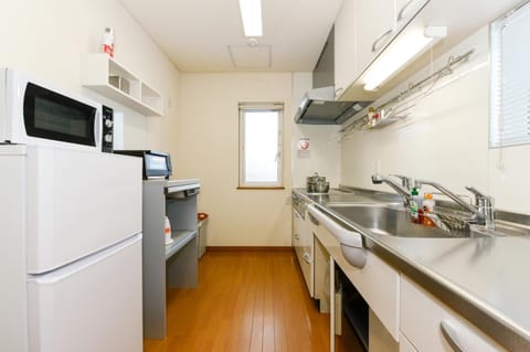 Apartment, 1 Bedroom | Private kitchen | Fridge, microwave, stovetop, electric kettle