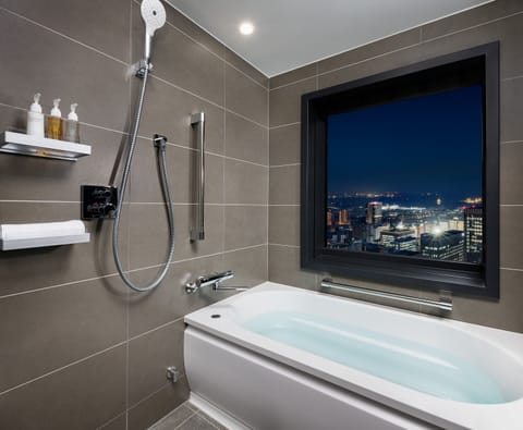 Twin Room, Non Smoking | Bathroom | Free toiletries, hair dryer, slippers, electronic bidet