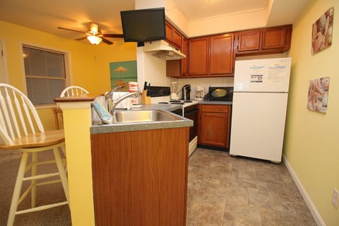 Standard Condo, 2 Bedrooms | Private kitchen | Full-size fridge, microwave, oven, stovetop