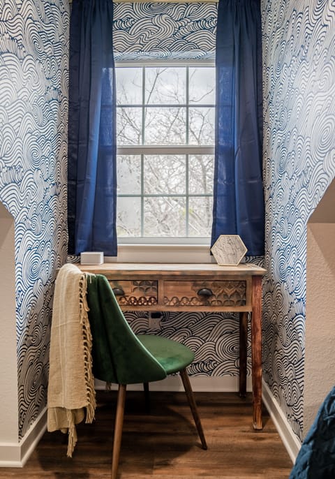 Johnny has a comfortable and private workspace.