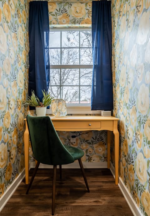 June bedroom has a comfortable and private workspace.