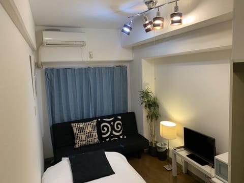 Apartment, Non Smoking | Desk, iron/ironing board, free WiFi, bed sheets