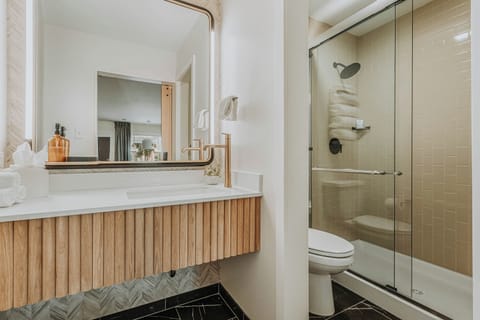 Standard King Bed | Bathroom | Free toiletries, hair dryer, towels, soap