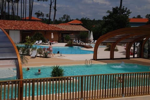 Indoor pool, seasonal outdoor pool, pool umbrellas, sun loungers