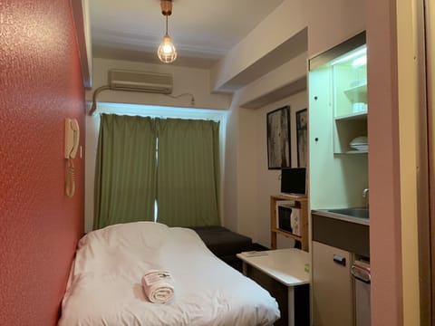 Apartment, Non Smoking | Desk, free WiFi, bed sheets