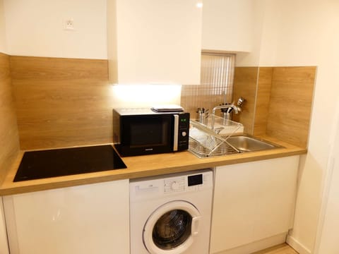 The kitchen is fully equiped with all you need to cook