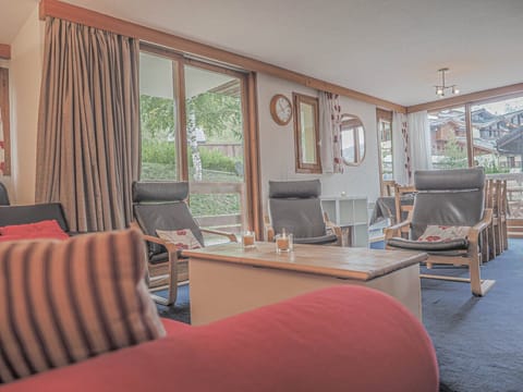 Light airy living area with access out to the South facing terrace