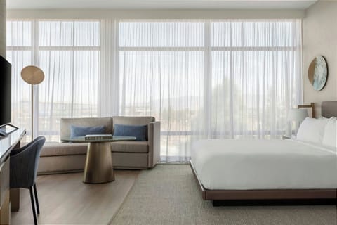 Junior Suite, 1 King Bed, Mountain View | In-room safe, laptop workspace, blackout drapes, iron/ironing board