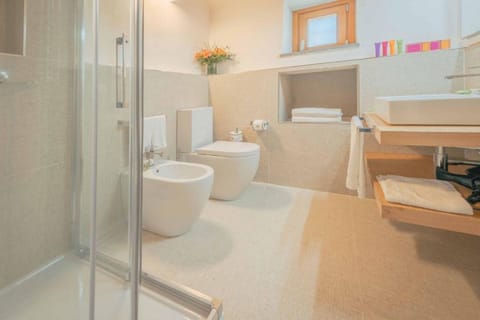 Apartment, 2 Bedrooms | Bathroom | Combined shower/tub, deep soaking tub, designer toiletries, hair dryer