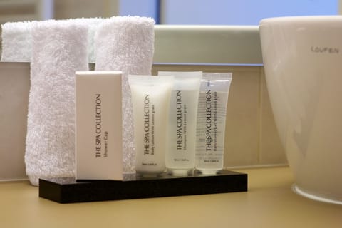 Premium bedding, down comforters, minibar, in-room safe